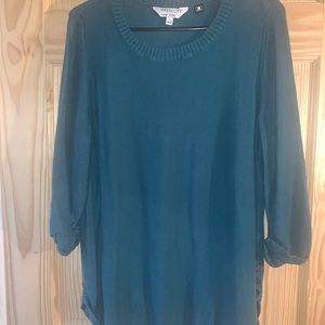 Sweater with buttons on side